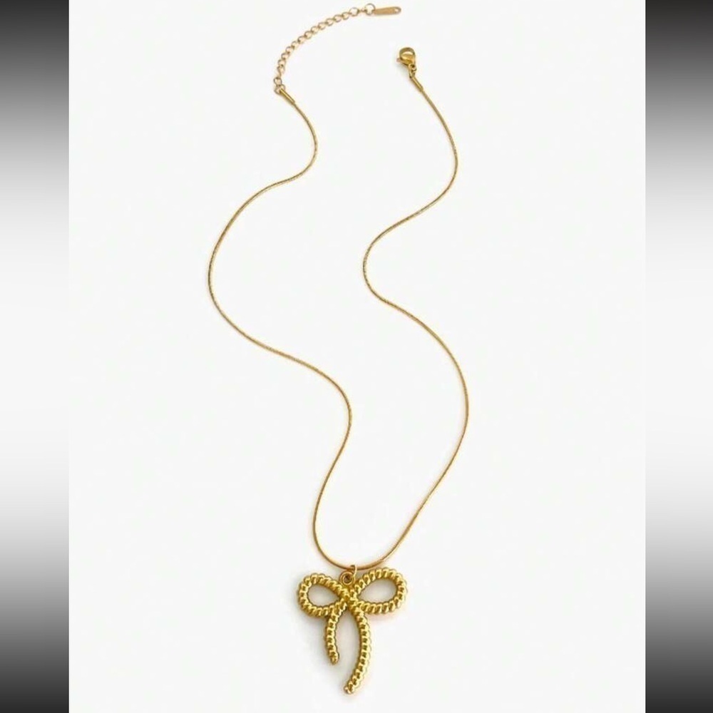 Anthropologie Bow gold necklace